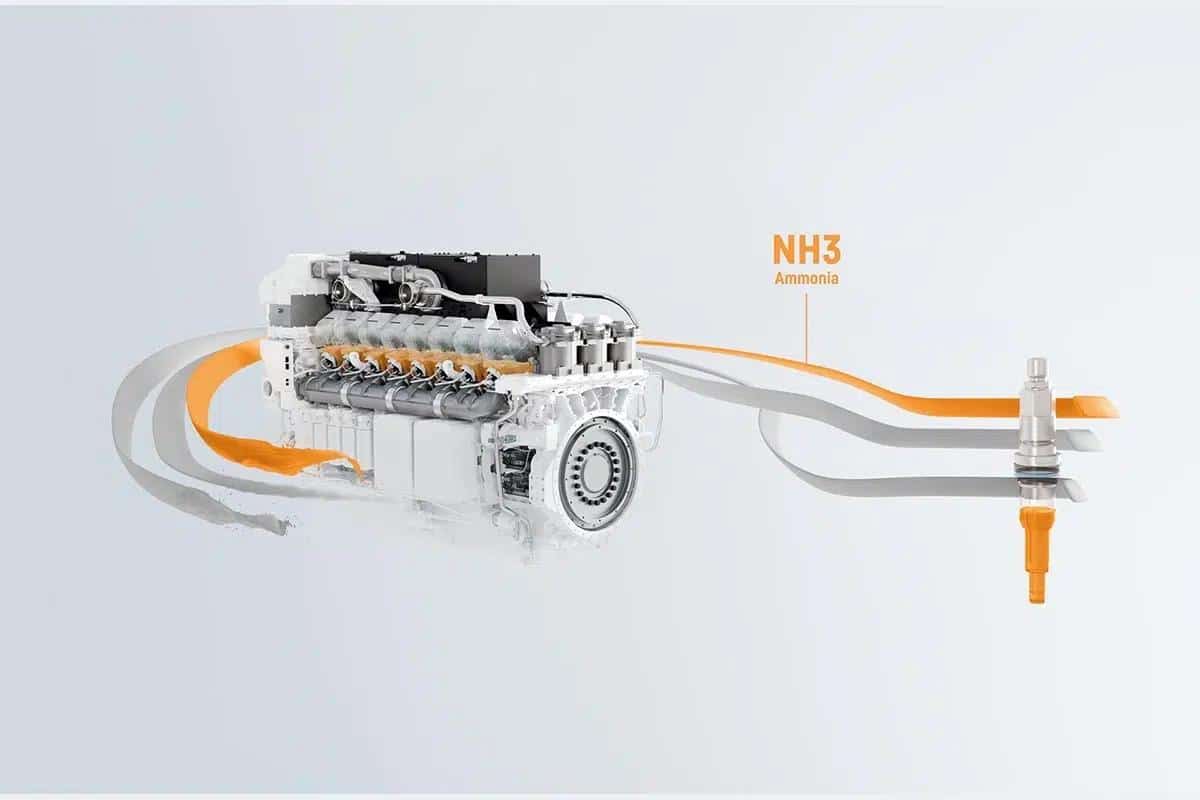 Grand moteur V16 Liebherr doté de quatre turbocompresseurs, présenté avec une partie du carter retirée pour dévoiler sa mécanique complexe.