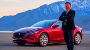Illustration de la stratégie unique de Mazda intégrant l'électrification et le moteur rotatif dans un SUV futuriste.